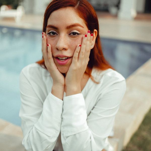 Person looking into the distance with a clear and bright gaze.